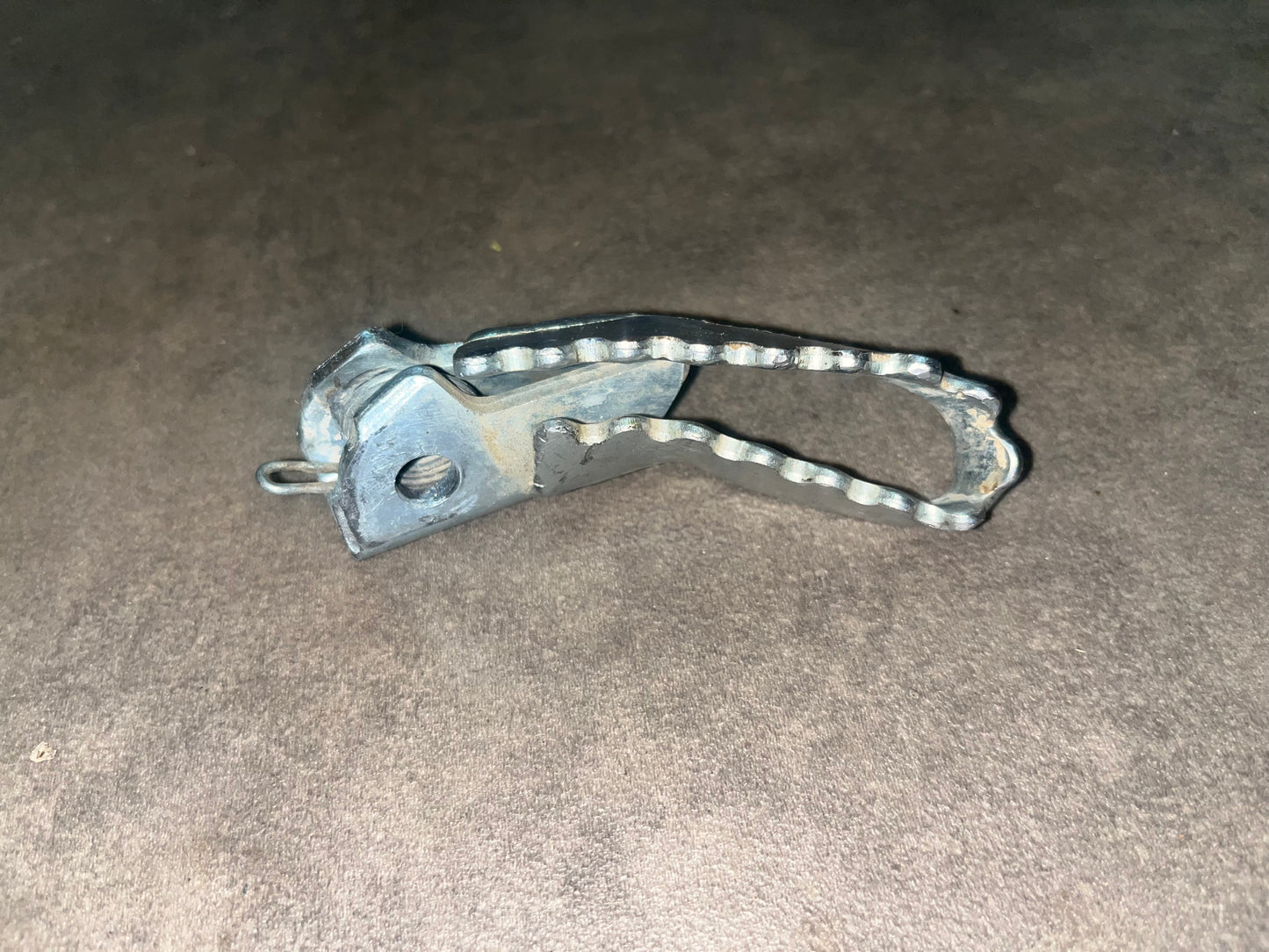 cale pied gauche crf 125